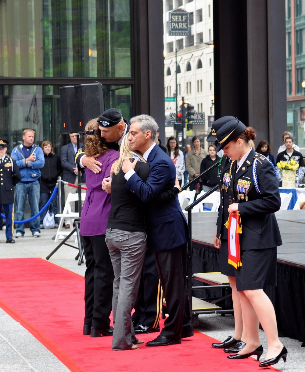 Gen. Odierno and Mayor Rahm Emanuel embrace Gold Star Family members