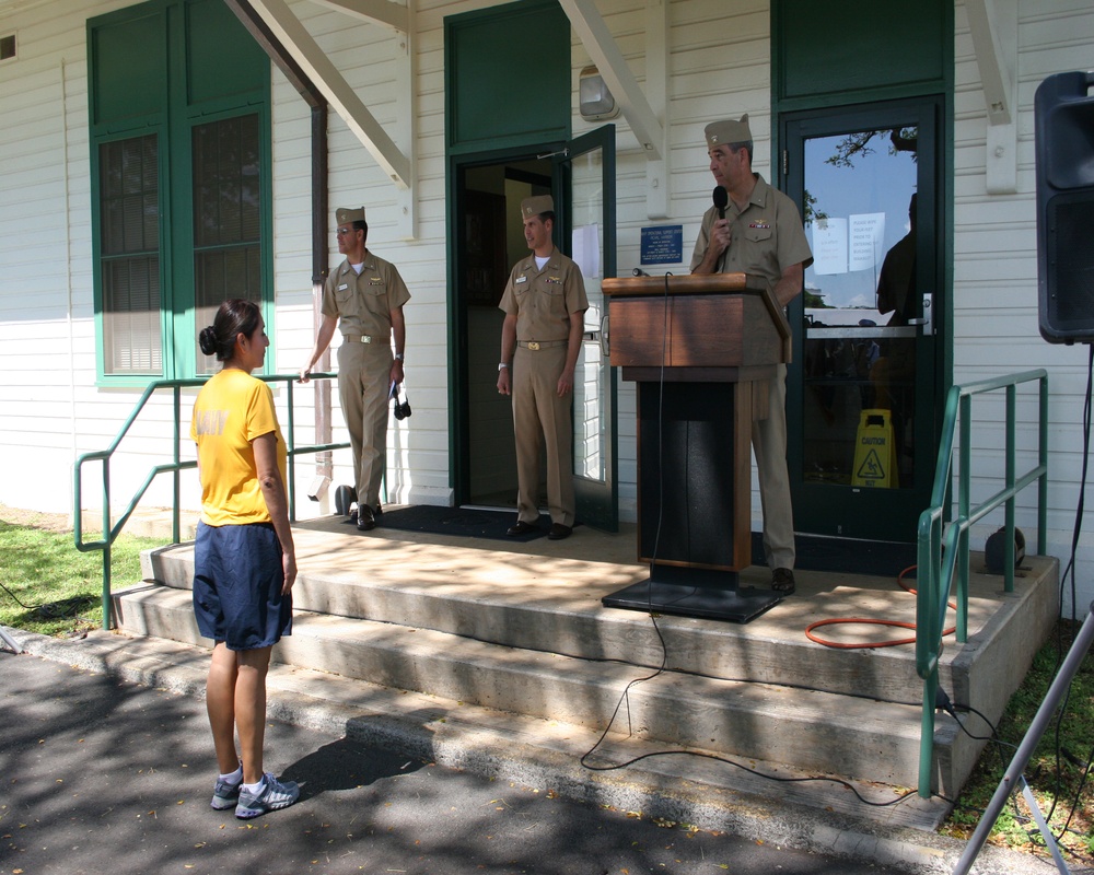 Rear Adm. Russell S. Penniman recognizes returning individual augmentee