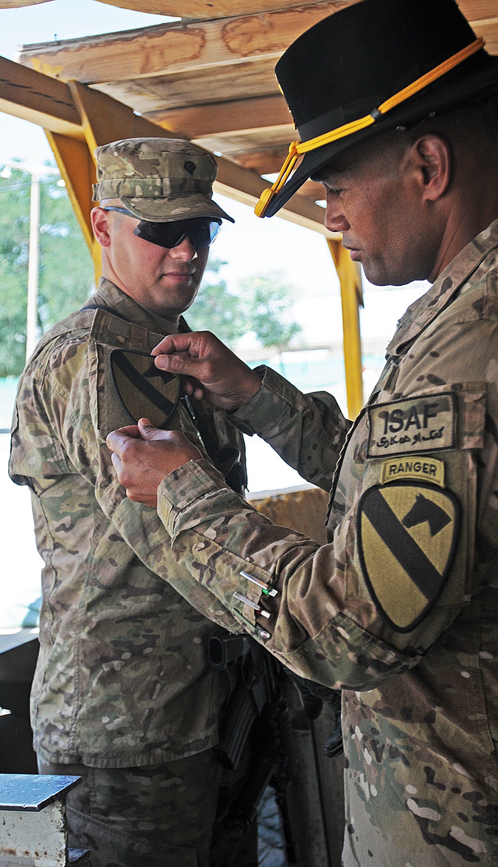 Command Sgt. Maj. Vimoto patches band member