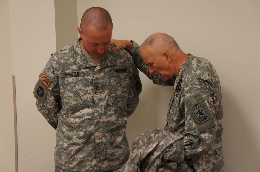 Soldier receives blessing from a general