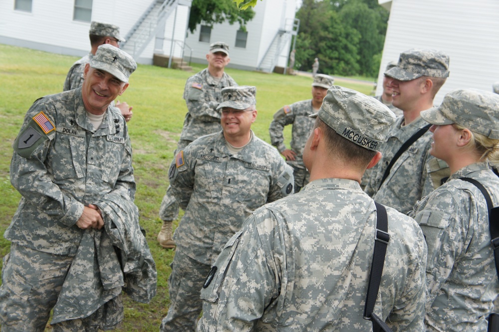 Chaplain Dolan visits With soldiers