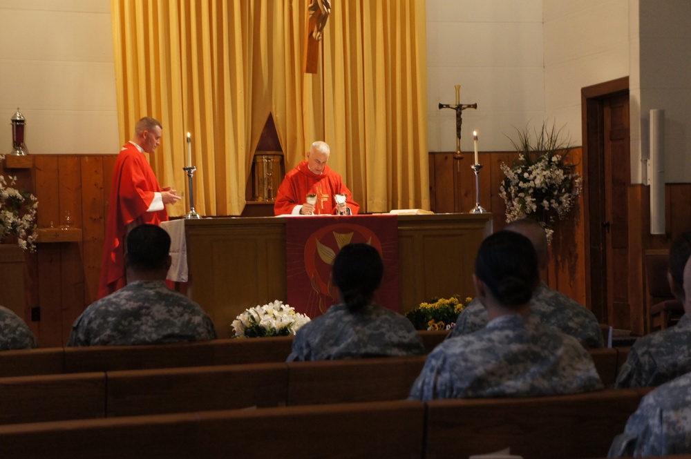 Chaplain Dolan conducts mass