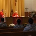 Chaplain Dolan conducts mass