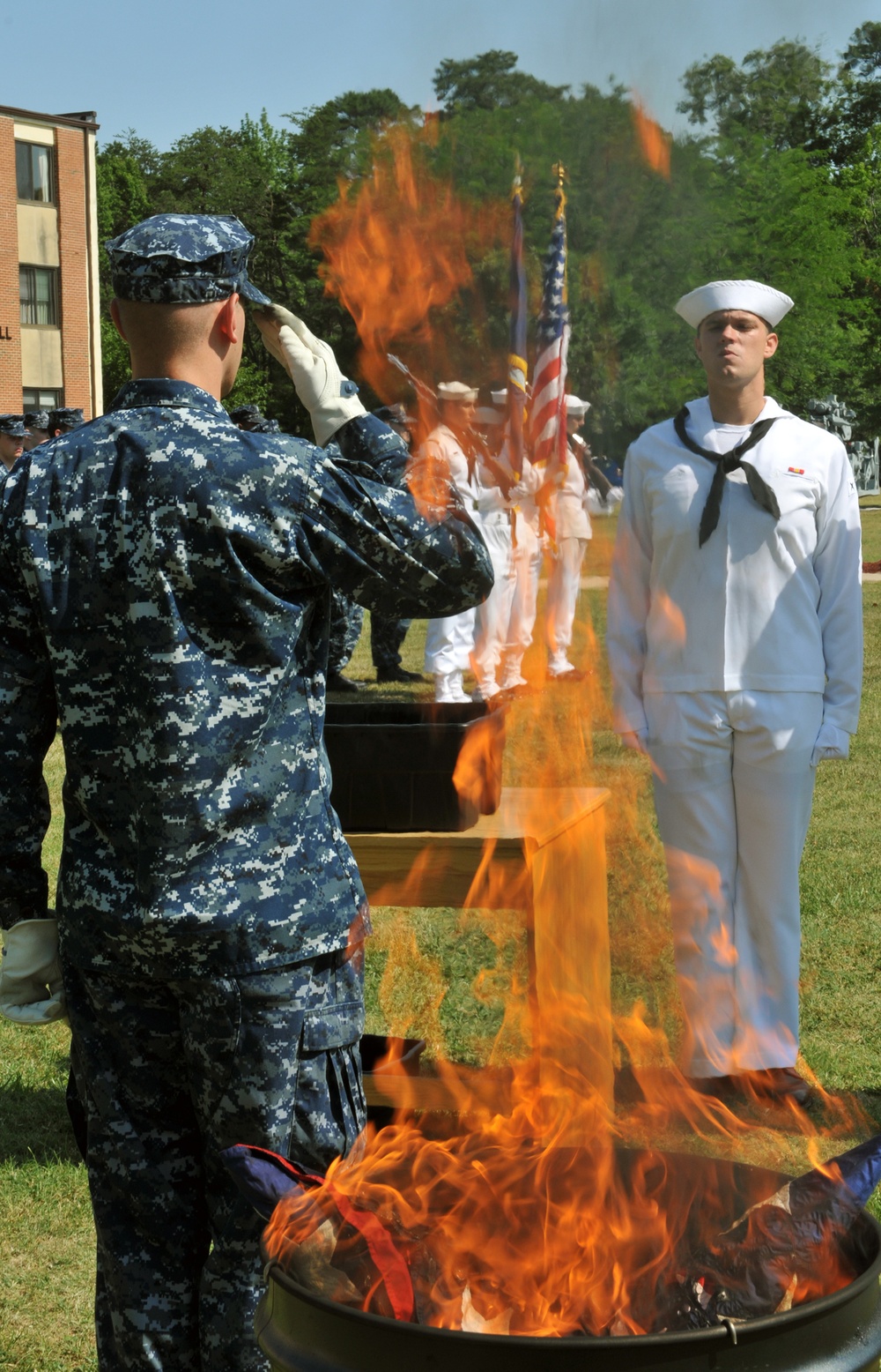 Sailors decommission flag