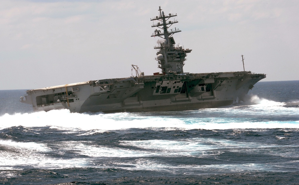 USS Dwight D. Eisenhower conducts rudder turns during sea trials