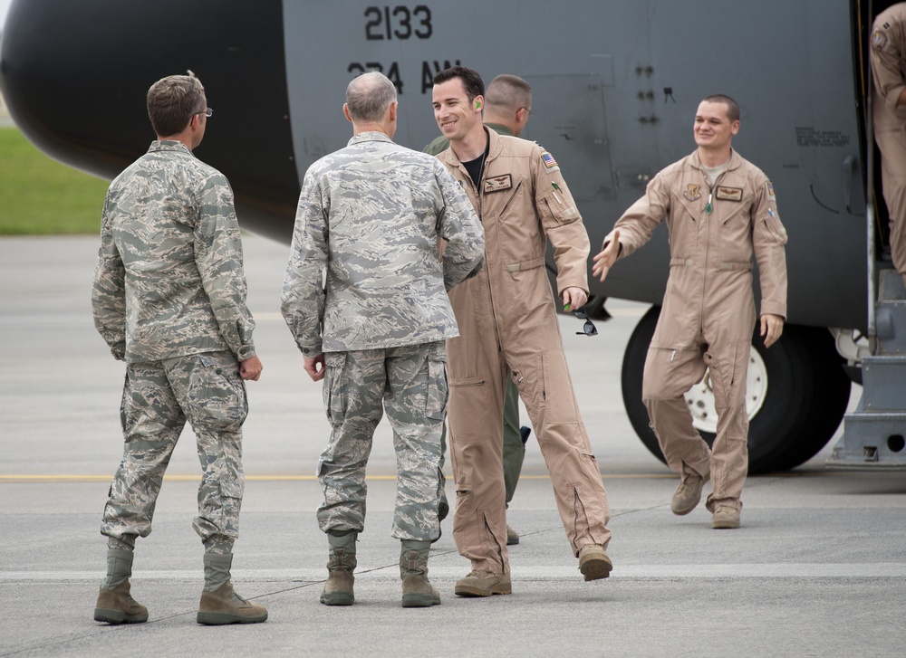 Families welcome home eagle airlifters