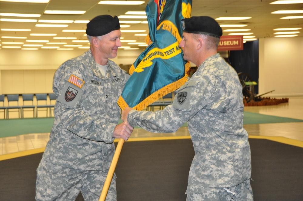 Col. Dave Wellons passes the colors
