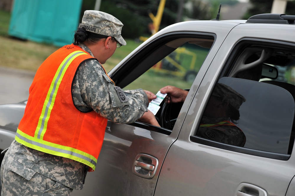 235th Military Police Company conduct traffic as residents return to homes in Dakota Dunes