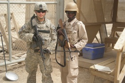 Greywolf, Ugandans side-by-side in US base security