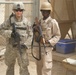 Greywolf, Ugandans side-by-side in US base security