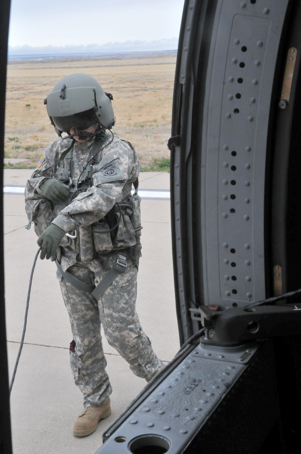 Clear up left! Clear up right! Corsair door gunners, crew chiefs take off in the Rockies