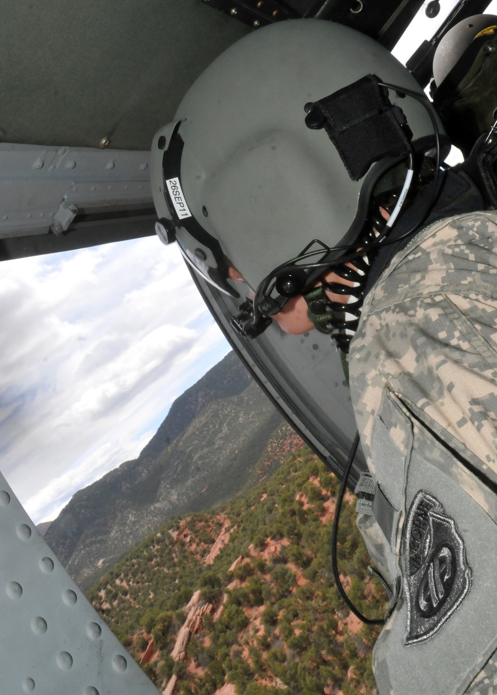 Clear up left! Clear up right! Corsair door gunners, crew chiefs take off in the Rockies