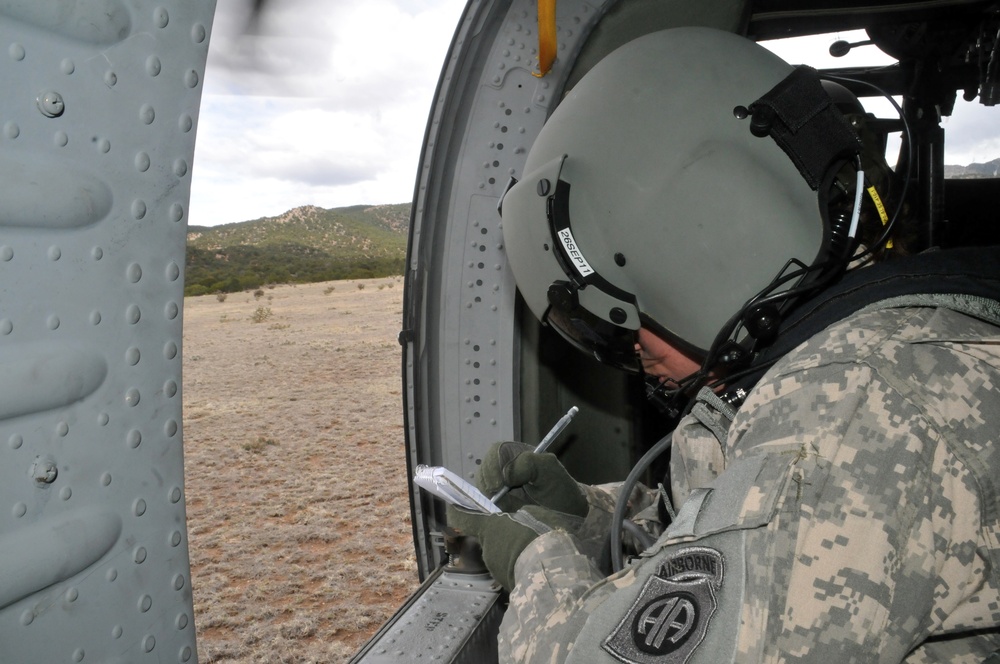 Clear up left! Clear up right! Corsair door gunners, crew chiefs take off in the Rockies
