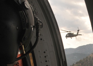 Clear up left! Clear up right! Corsair door gunners, crew chiefs take off in the Rockies