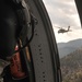 Clear up left! Clear up right! Corsair door gunners, crew chiefs take off in the Rockies