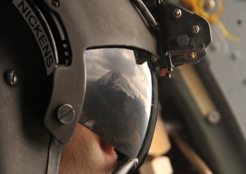 Clear up left! Clear up right! Corsair door gunners, crew chiefs take off in the Rockies