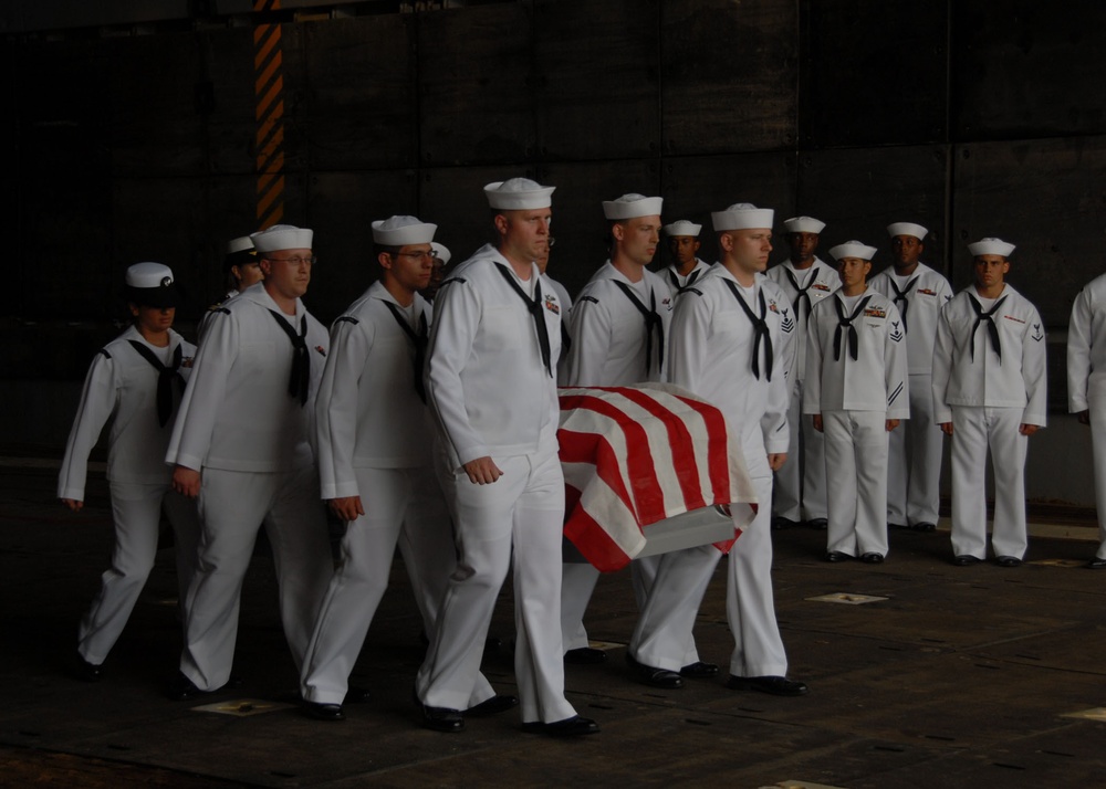 USS Oak Hill sailor conduct burial at sea