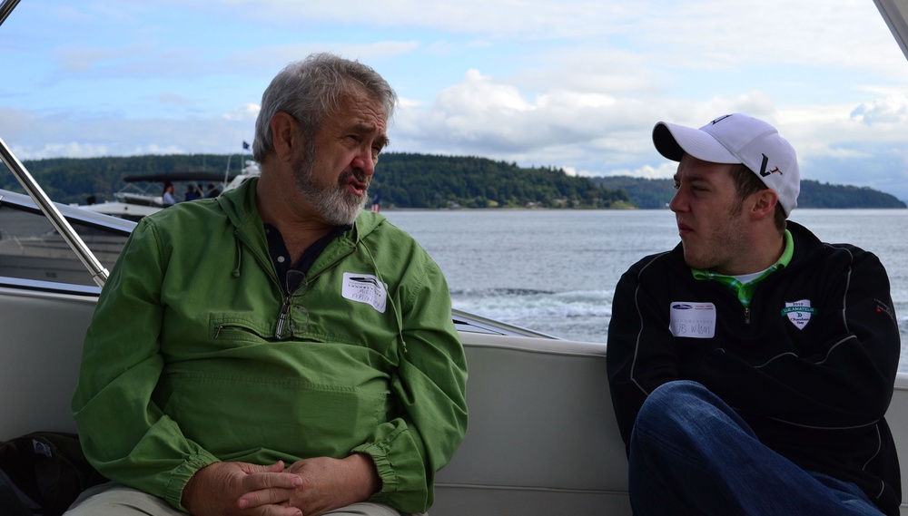 Attendees engage in conversation during the annual Evergreen Fleet Cruise
