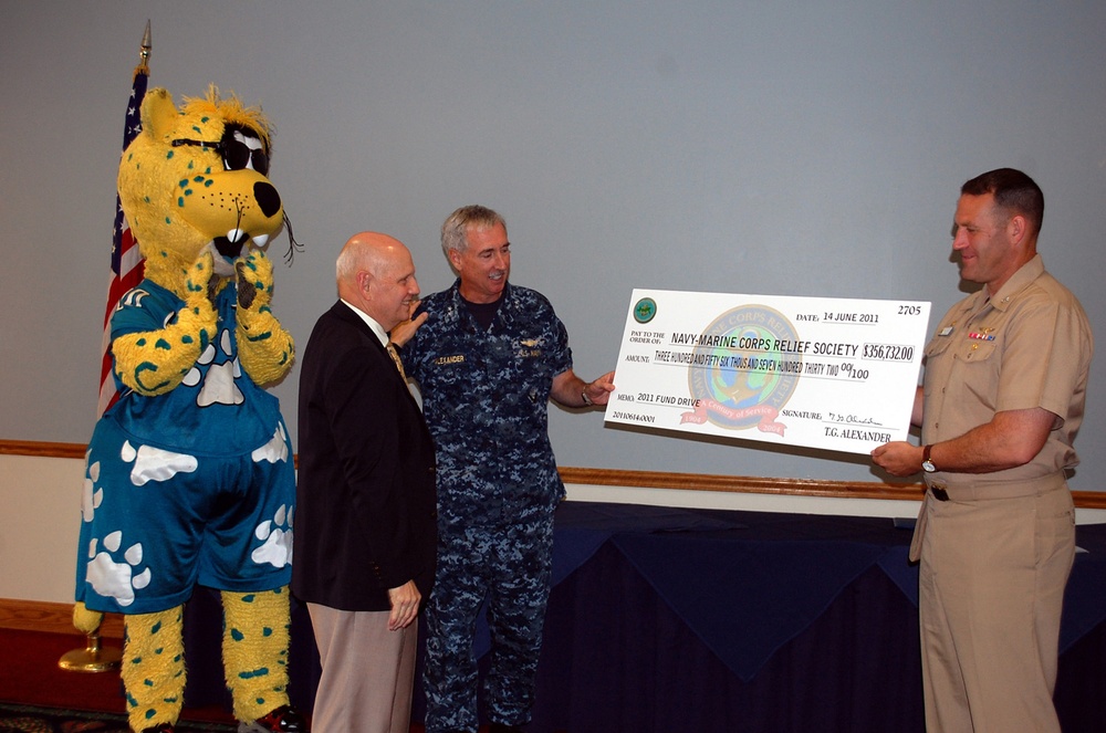 Navy leaders present check to Navy &amp; Marine Corps Relief Society