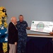 Navy leaders present check to Navy &amp; Marine Corps Relief Society