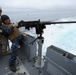 Sailors fire machine gun during Shark Tank 2011