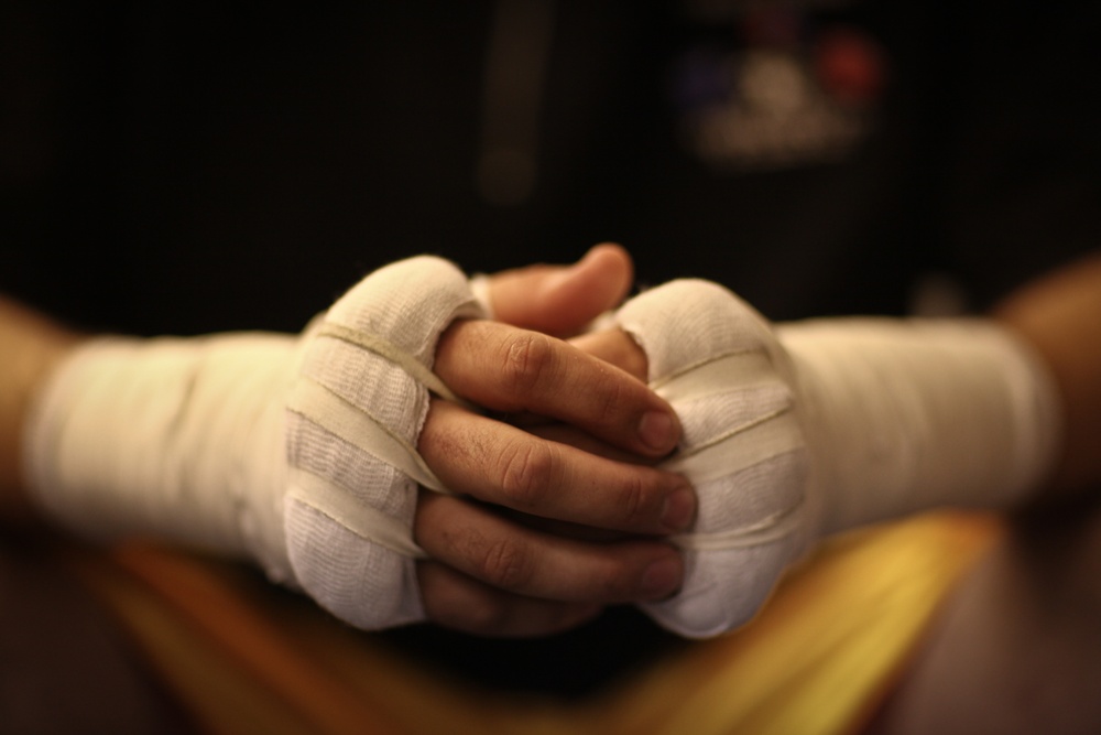 Marine taped up, focused, ready to fight