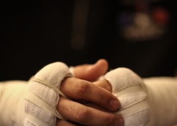 Marine taped up, focused, ready to fight