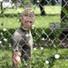 Marine cleans through the fence