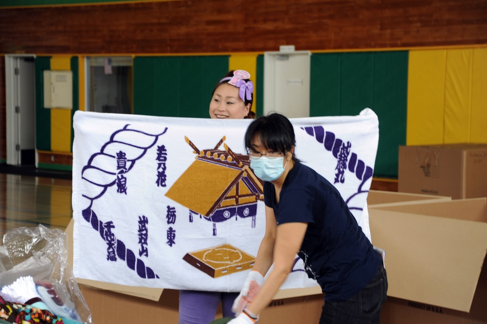 Misawa Air Base volunteers sort Operation Airlift Japan items