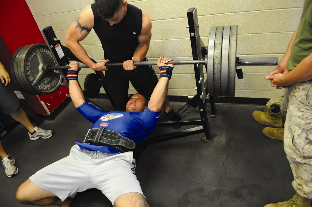 Carrying your own weight: station Marine pushes 402 lbs.
