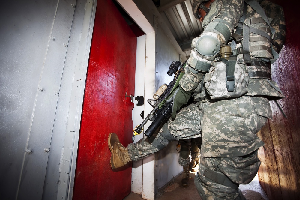 Building confidence by the basics: Famed Army ‘Purple Heart Battalion’ practices clearing K-Bay shoot house