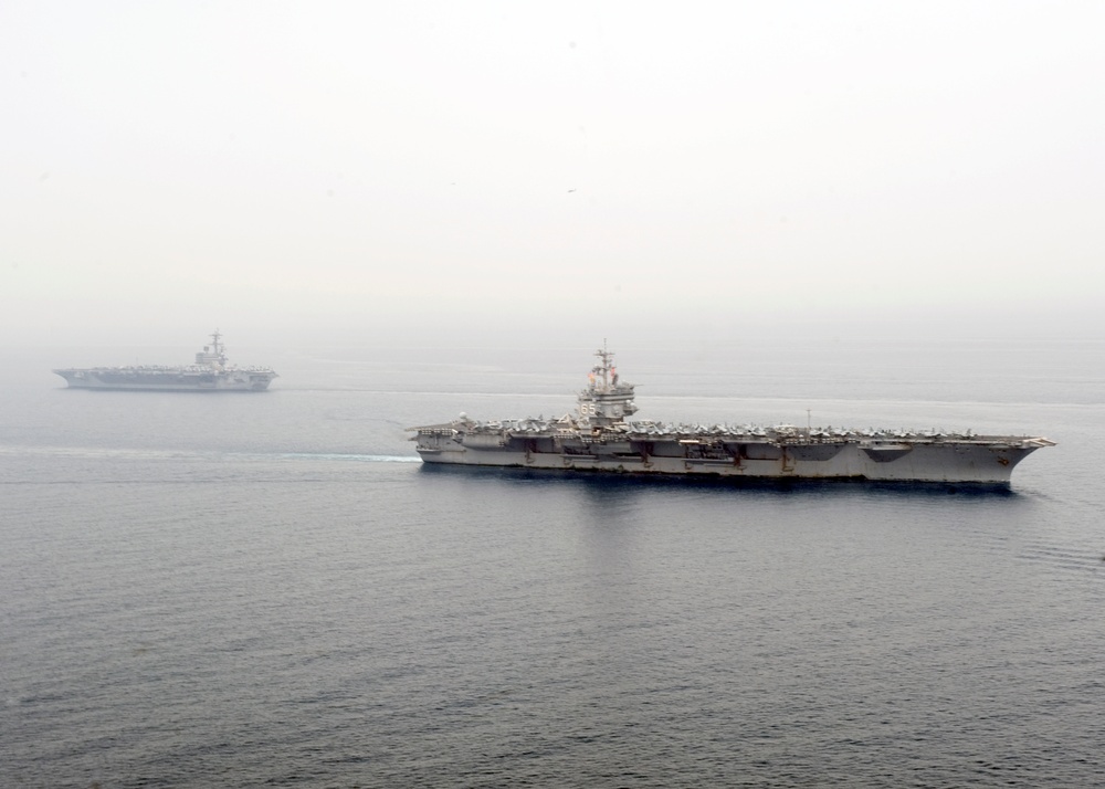 Aircraft carriers pass