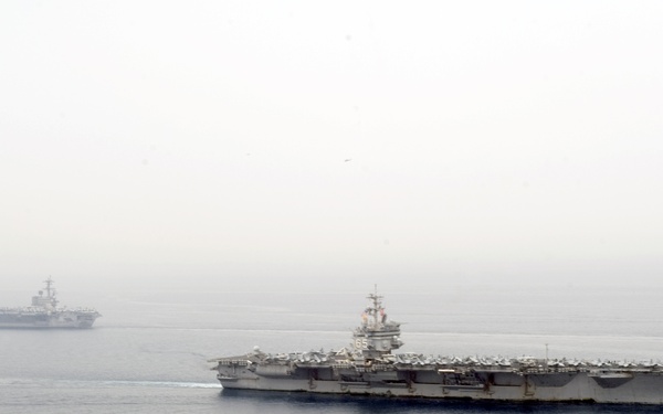 Aircraft carriers pass
