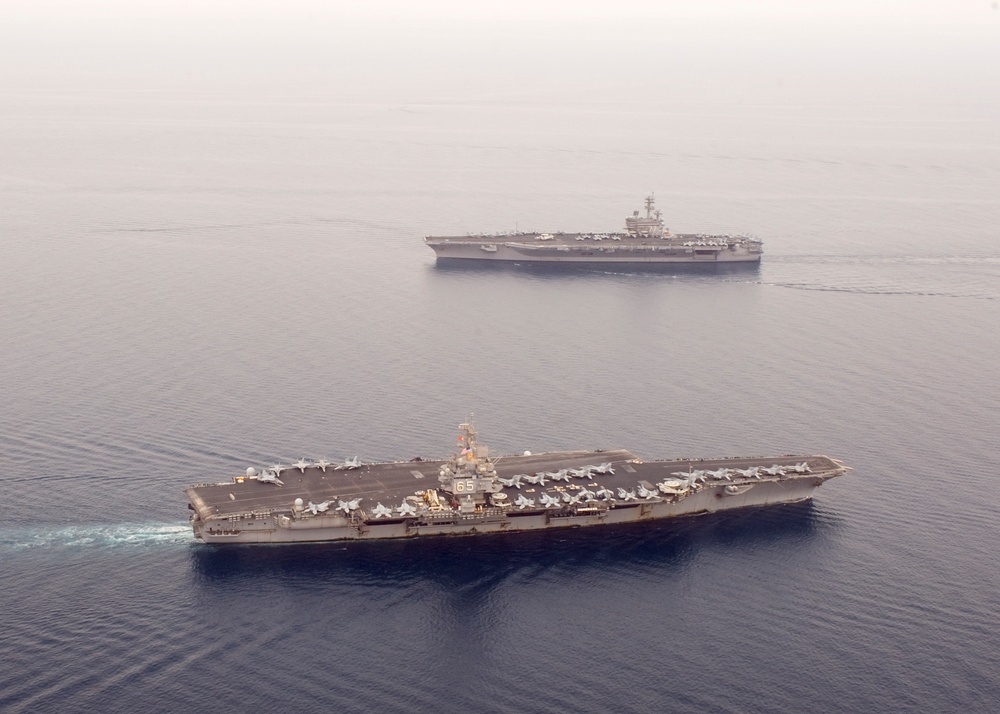 Aircraft carriers pass