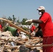 Joplin, Mo., June 23 - KC Chiefs' Rodney Hudson helps out