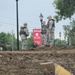 Minot emergency workers patch Broadway levee