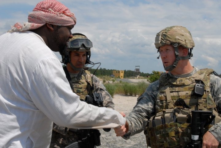 Soldiers meet with village locals