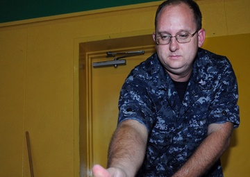 Sailors from Mobile Mine Assembly Unit Eight support Operation Airlift Japan