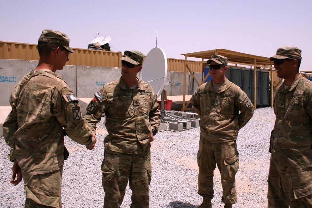 Greets a soldier