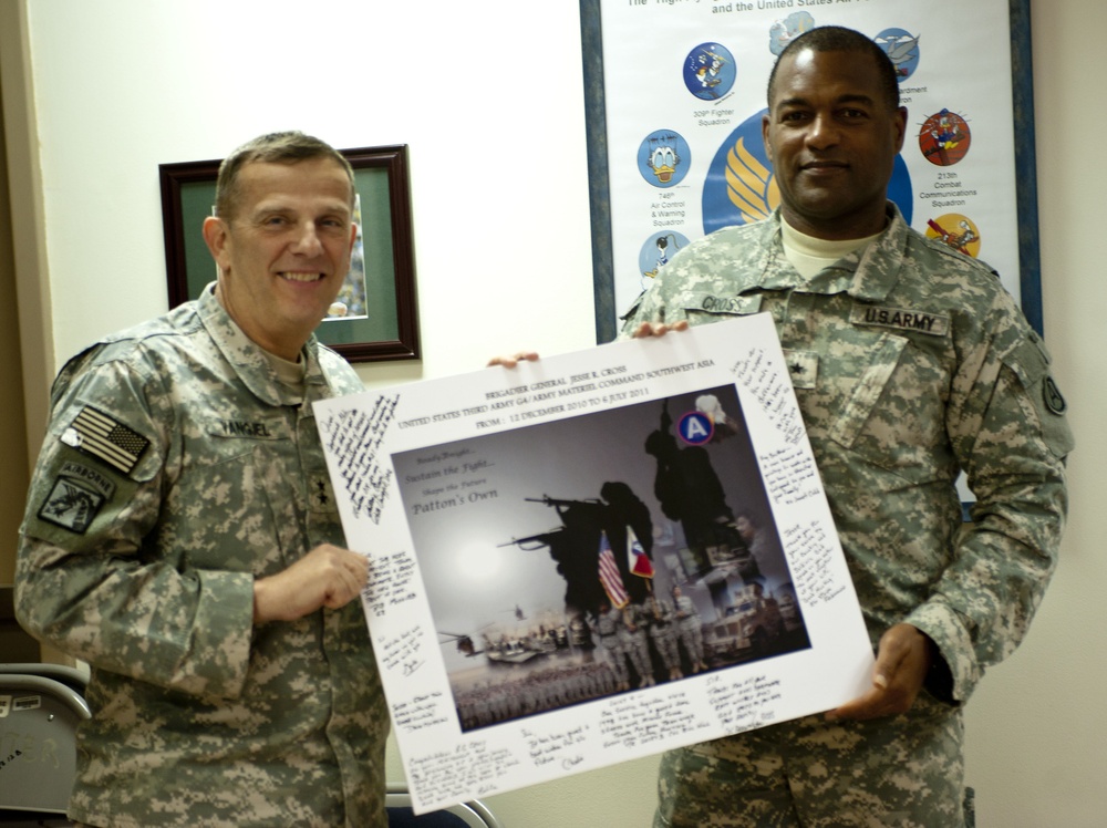 Maj. Gen. Peter Vangjel presents plaque