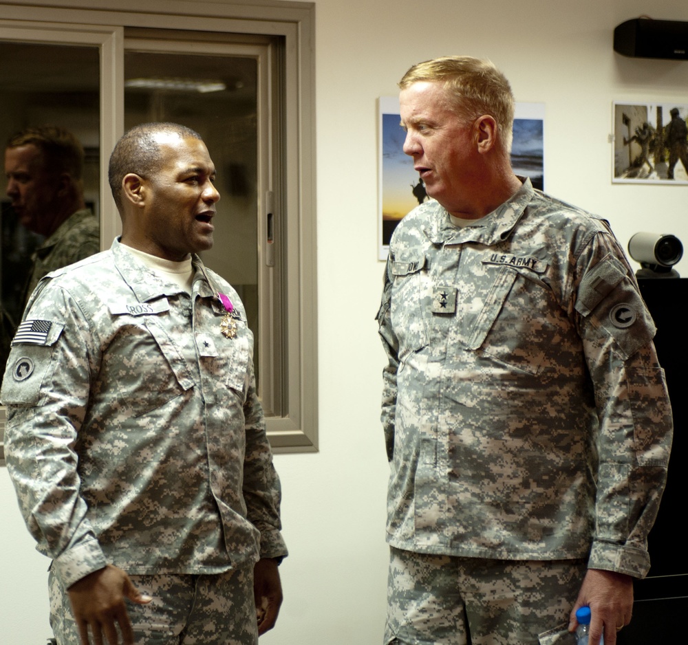 Brig. Gen. Jesse R. Cross speaks with Maj. Gen. Kenneth S. Dowd