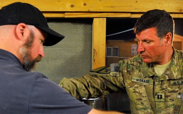 Weekly pizza night in Bagram