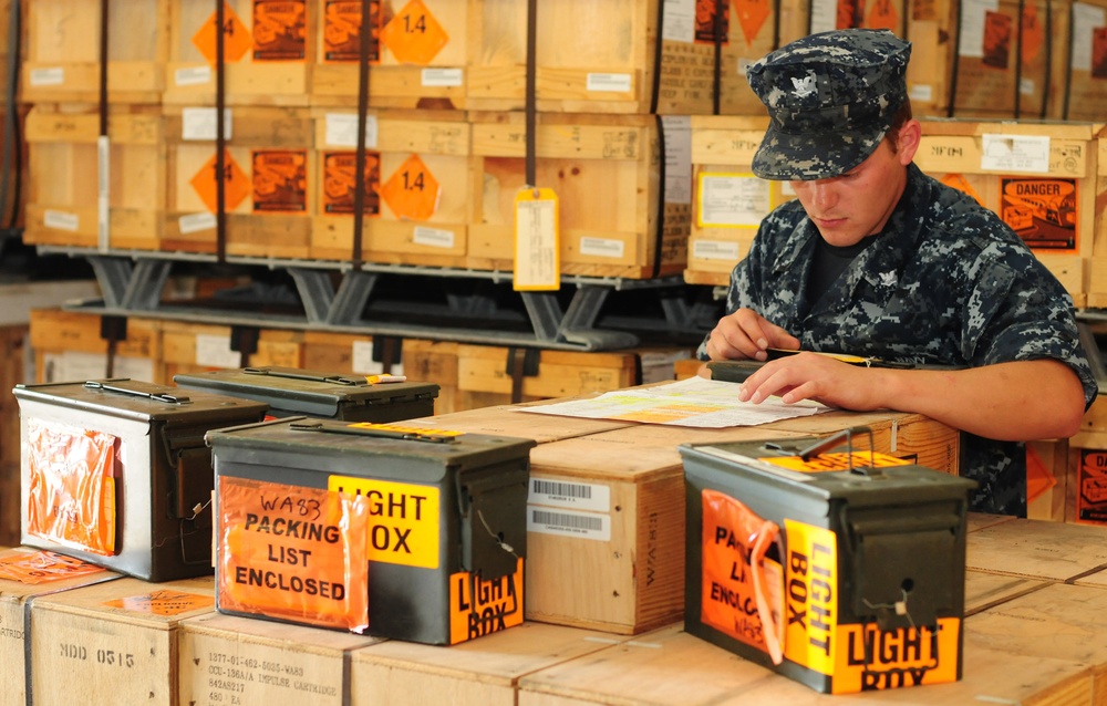 Sailor checks munitions during Operation Unified Protector