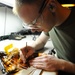 USS Enterprise sailor repairs a flex print assembly