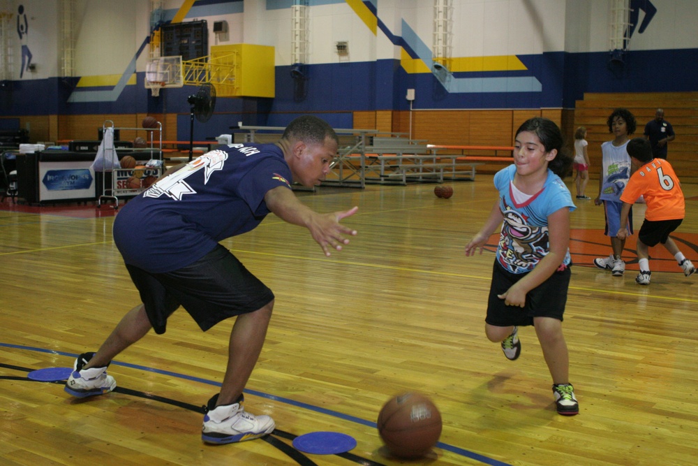 Sports camps teach children sportsmanship, fundamentals