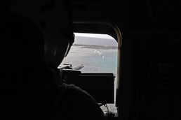 Marines gain proficiency with machine guns during flight