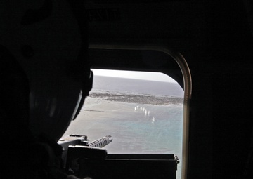 Marines gain proficiency with machine guns during flight