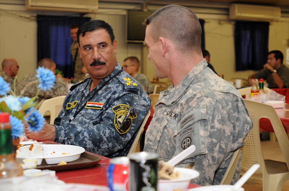 Red Falcons commander meets with local IP commander