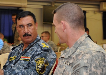 Red Falcons commander meets with local IP commander
