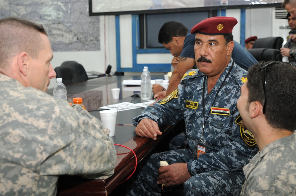 Red Falcons commander meets with local IP commander
